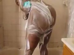 Big booty african takes a shower