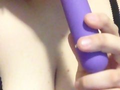 Busty teen blows toy